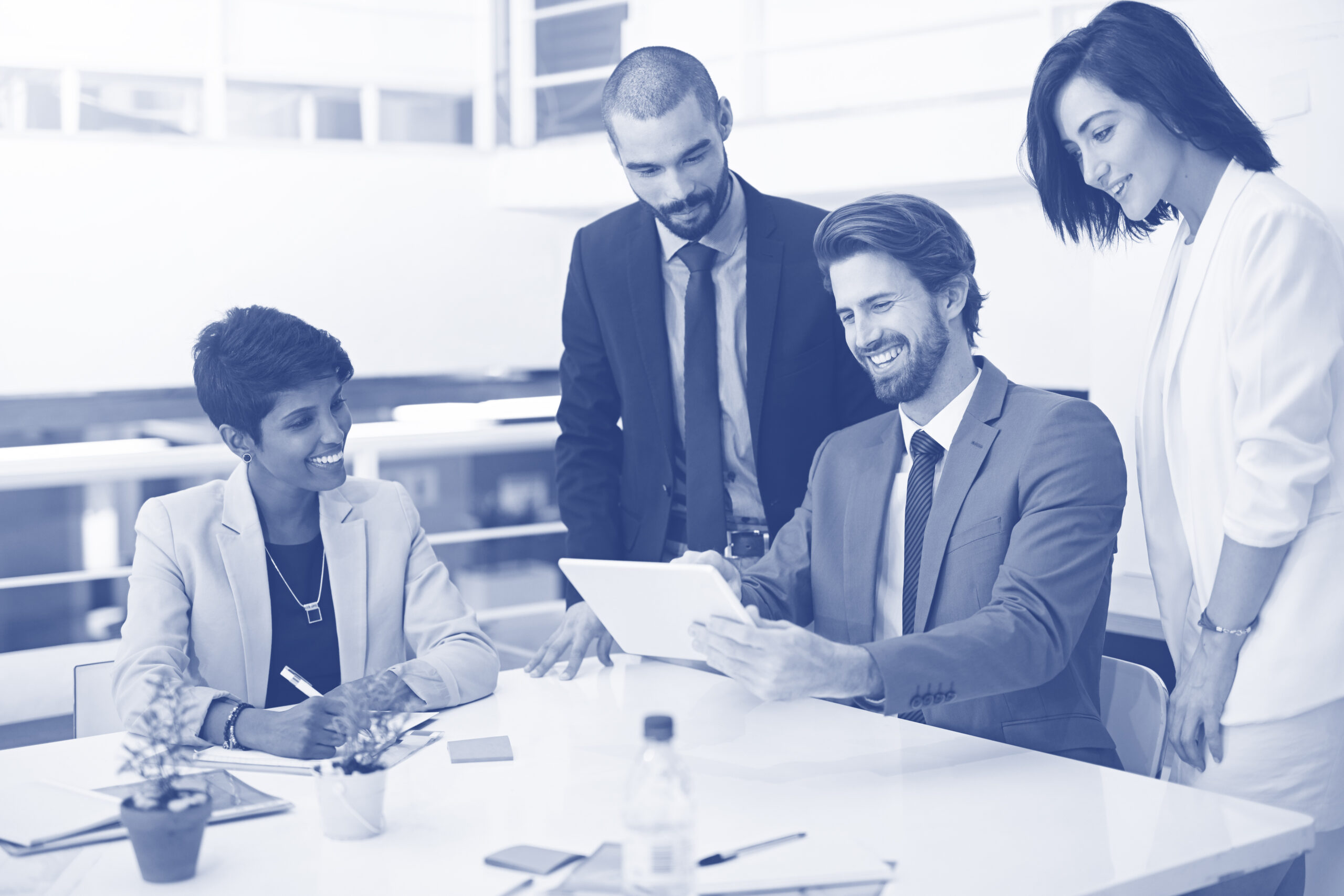 Business people, tablet and meeting for collaboration, communication and feedback with diversity. Team, technology and proposal for change management, culture development and capital growth in office