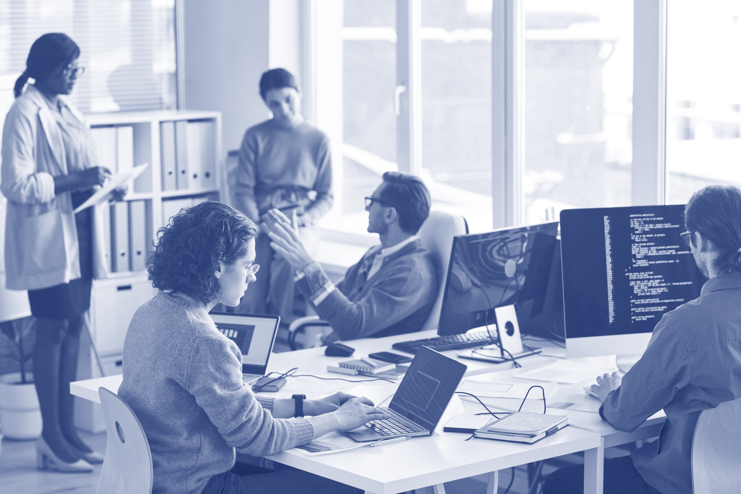 IT Development Team Working in Office