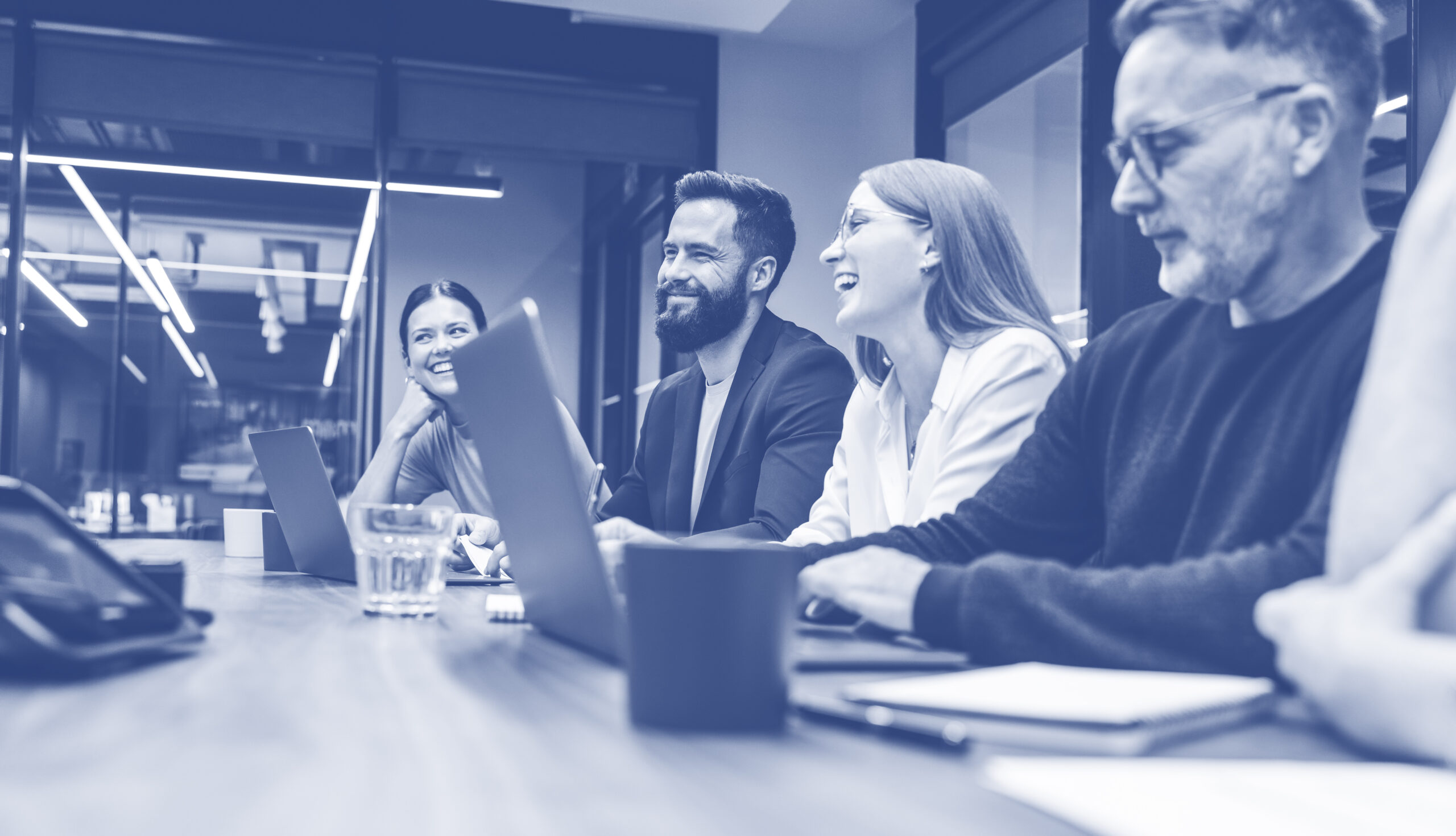 Positive businesspeople having a meeting in a boardroom