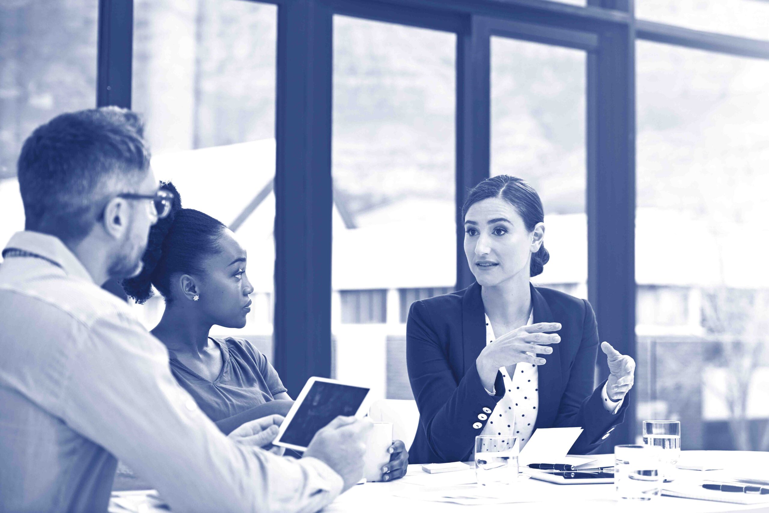 Formulating new ways to do business. Cropped shot of a group of colleagues having a meeting in an office.