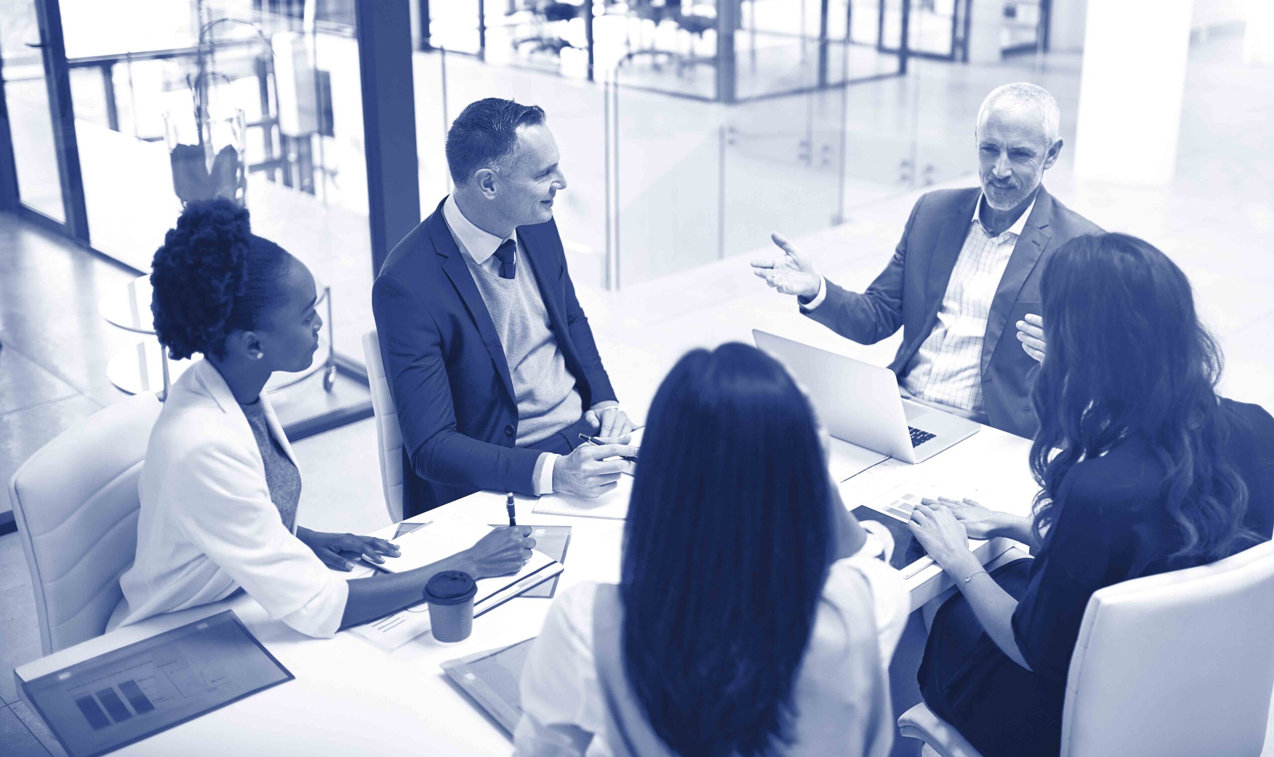 Taking charge of business. Cropped shot of businesspeople having a meeting in a modern office.